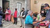 Cops spoil elderly while promoting Older Persons Act, officers go door to door with gifts