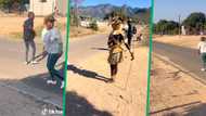 Lady sprints in fear of "Magwera" walking down the road in hilarious video: “She a runner she a track star"