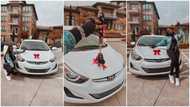 Young lady buys herself lux white car to mark 24th birthday, shares photos