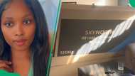 South African woman unboxes 86-inch TV bought with cash, Mzansi is in awe