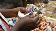 Nigeria's cash shortage eases after strike threat