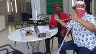 Trompies member Eugene Mthethwa chains himself inside SAMRO offices