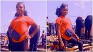"You go girl": Reactions as stunning lady starts selling clothes by the roadside