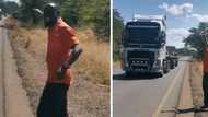 'Truckspotting' is real! Watch a Zambian dance in delight as gleaming Volvo truck driver toots horn and flashes lights