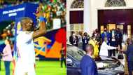 Ugandan President Yoweri Museveni hands Sundowns keeper Denis Onyango new car