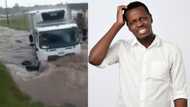 Eish: Video of truck stuck in the middle of a flooded waterway leaves peeps confused, “Where was he going?”