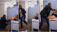 Lovely video shows moment man surprisingly showed up at his wife's office, danced and gave her pizza