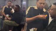 Man feeds friend chips mid-groove, SA cracking up over booze-fuelled bromance