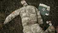 Ukraine probes suspected mass burial on Russia border
