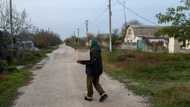 Homesick Ukrainians test luck along Kherson front