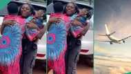 8 years after, lady who moved abroad when she was single returns with 3 kids, her family celebrates