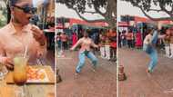 Hilarious video of girl busting traditional dance moves in the streets in heels on date has Mzansi howling