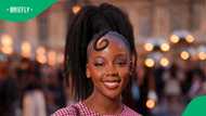 Thuso Mbedu turns heads in chic pink minidress at Louis Vuitton show, reveals what’s in her bag