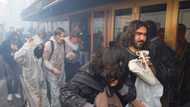 French police teargas protesters at oil giant's meeting