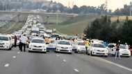 Joburg e hailers protest with slain driver's body amid safety concerns, SA bemoans situation