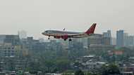 Police arrest Indian executive for urinating on plane passenger