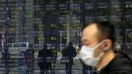 Asian markets struggle as traders contemplate more rate hikes