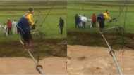 ANC gets dragged online after clip of mother crossing river goes viral