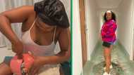 A woman opened her piggy bank in a new video, showing off the R19k she had saved