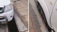 A Toyota Hilux driver found his front tyre stuck in a drain and couldn't get out