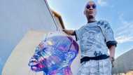 Award winning actor Warren Masemola flexes stunning car vinyl wrap