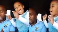 Little girl steals hearts as she sings gospel song alongside her dad