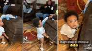 Baby with hulk strength picks up ottoman in viral TikTok video with 1.4 million views: "Give him some weights"