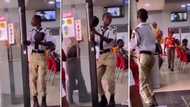 Security guard opens door at restaurant while dancing his heart away, Mzansi loves the free spirit: "Mood"