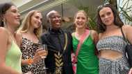 Julius Malema shares snap of him with 4 young ladies, people of Mzansi have a lot to say about the saucy pic