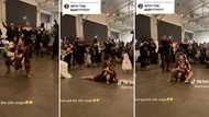 Vibey woman twerks and splits on wedding dance floor while carrying her baby, amusing video goes viral