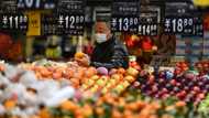 Asian markets mixed as traders pause ahead of US inflation data