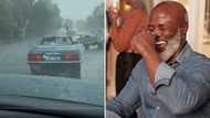 Video of couple driving in old fashioned Mercedes convertible in heavy rain has SA peeps laughing out loud