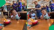 "He's so bored": Baby goes viral for unimpressed reaction to birthday surprise at Spur, SA amused