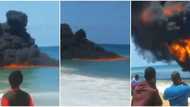 Video shows strange fire on the water at a beach, people have no idea what's burning