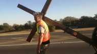 Video shows a local man who carries cross walking to Zimbabwe