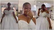 Emotional moment: Young lady sheds tears of joy as she wears white wedding gown in viral video, People react