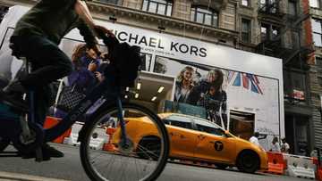 Coach owner to acquire Michael Kors, Versace parent in $8.5bn deal