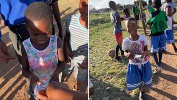 BI Phakathi gets kids off the street, encourages them to play soccer and blesses them with cash