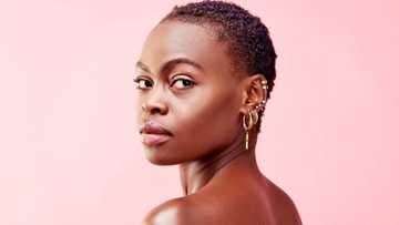 Daring woman’s dimple piercings in her back leave internet wondering about the pain