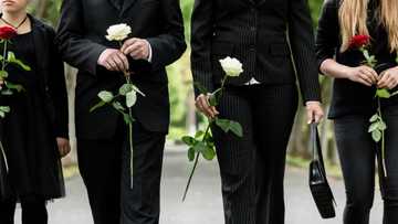 Coronavirus: Funeral parlour vehicles line up outside Durban hospital