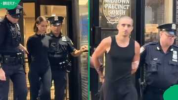 “They made history”: Empire State Building couple pictured in handcuffs after wild proposal