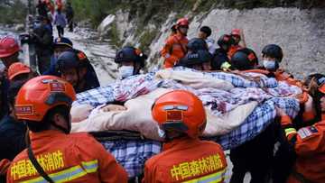 Rescuers scour for survivors after dozens killed in China quake