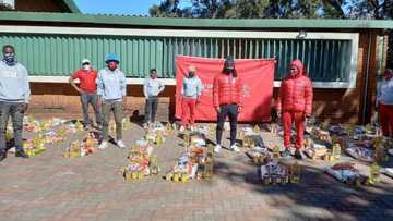 “God bless you Shabba”: Siphiwe Tshabalala donates food parcels in Soweto