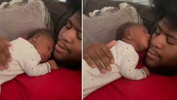 Adorable video of a tiny baby kissing daddy back while napping on his chest has melted the hearts of people