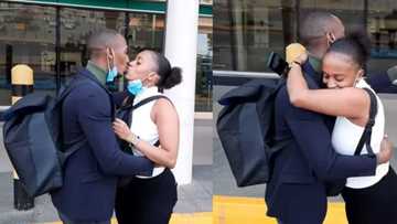 Couple in long distance relationship gets emotional at airport after reuniting