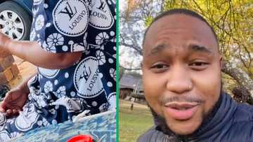 Son shares Video of his mother rocking a Louis Vuitton knockoff, Mzansi loves it:"Okusalayo it’s LV"