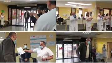 Doctors & nurses give standing ovation and cash to taxi driver who transports hospital patients for free