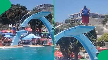 "Comfortable and confident": Onlookers cheer for man doing belly flop at swimming pool