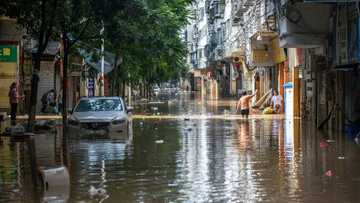 Record floods threaten southern China