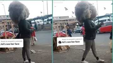 Nigerian lady storms main road with showstopper afro hairstyle, video trends